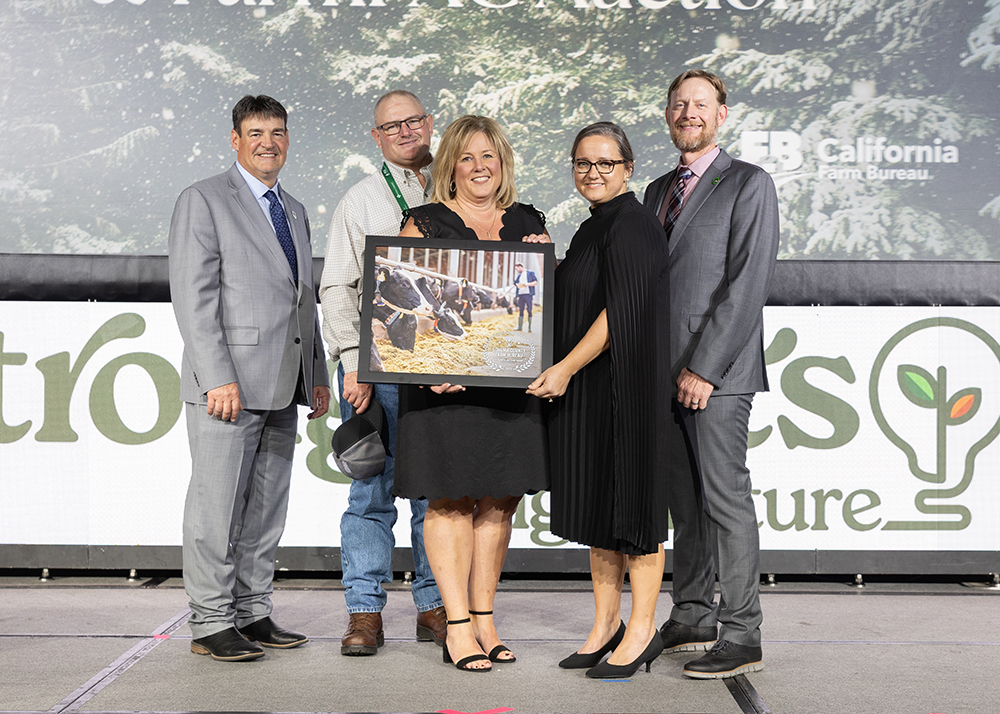 Pat Burns, second from left, and Dayna Ghirardelli, center, accept the County of the Year Award on behalf of Sonoma County Farm Bureau from Ron Peterson, left, Shannon Douglass and Shaun Crook.