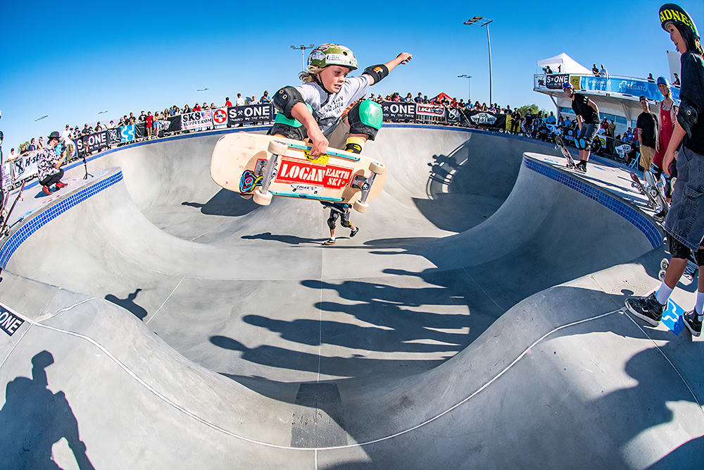 Competitive skateboarder Kelley Apanowicz rides a skateboard equipped with Tracker trucks.
