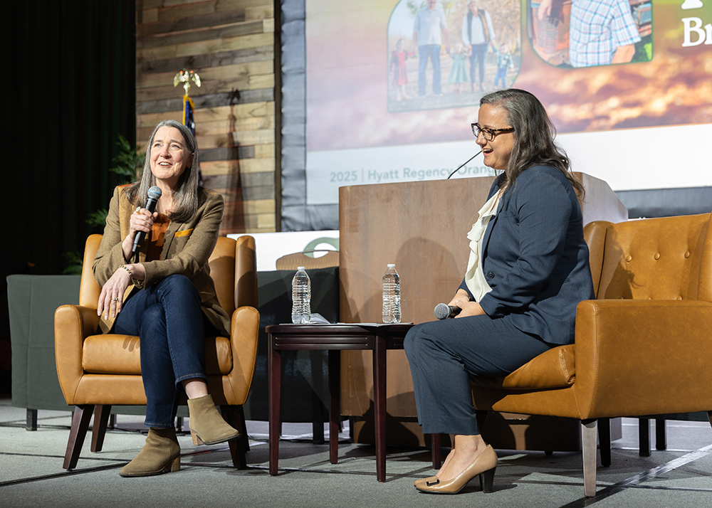 Pacific Gas and Electric Co. CEO Patti Poppe, left, speaks with California Farm Bureau President Shannon Douglass on stage last week during the Farm Bureau’s 107th Annual Meeting in Anaheim.