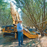 Less dust, cost a benefit of shake-and-catch harvest