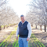 Farmers, researchers seek to reduce orchard water needs