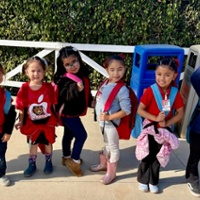 Students receive 'Giving Back' backpacks