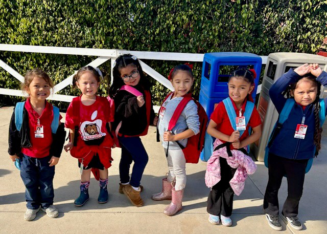 Students receive 'Giving Back' backpacks