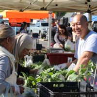 Farmers markets fight rain, lighter traffic