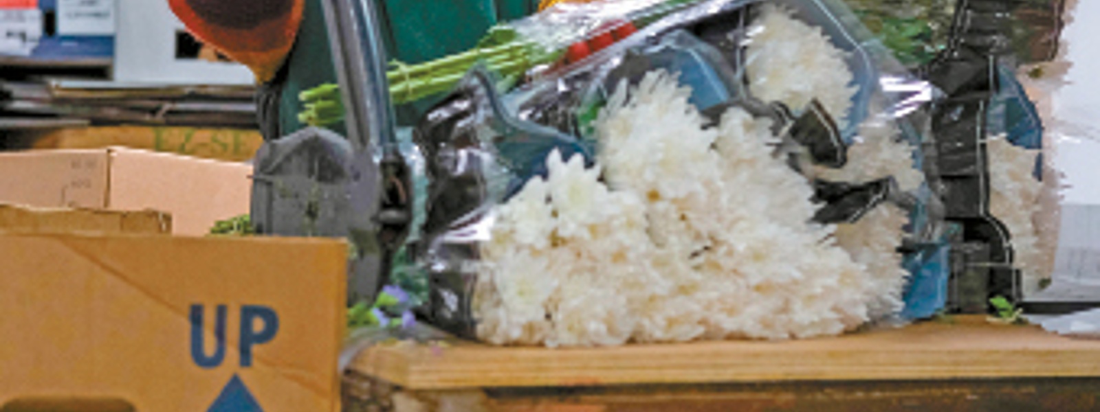 Valentine's Day brings sales and trials for flower farms